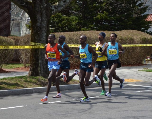 Male front runners, including winner Lelisa Desisa, Boston Marathon, 2013. Photo by Rick Chalmers